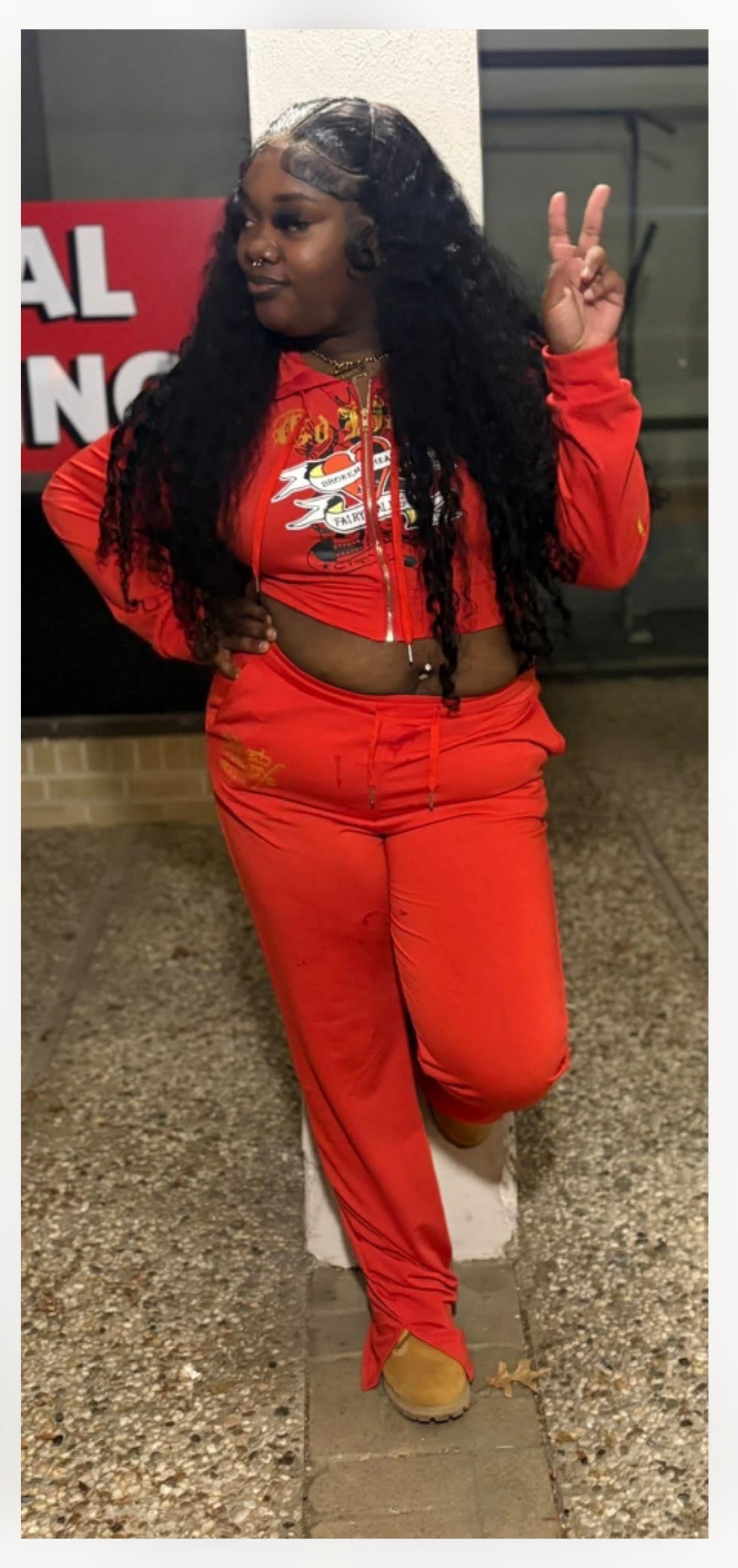 Tall Friendly Graphic Pant Set modeled by a woman, showcasing a graphic pant set for tall women in vibrant red.