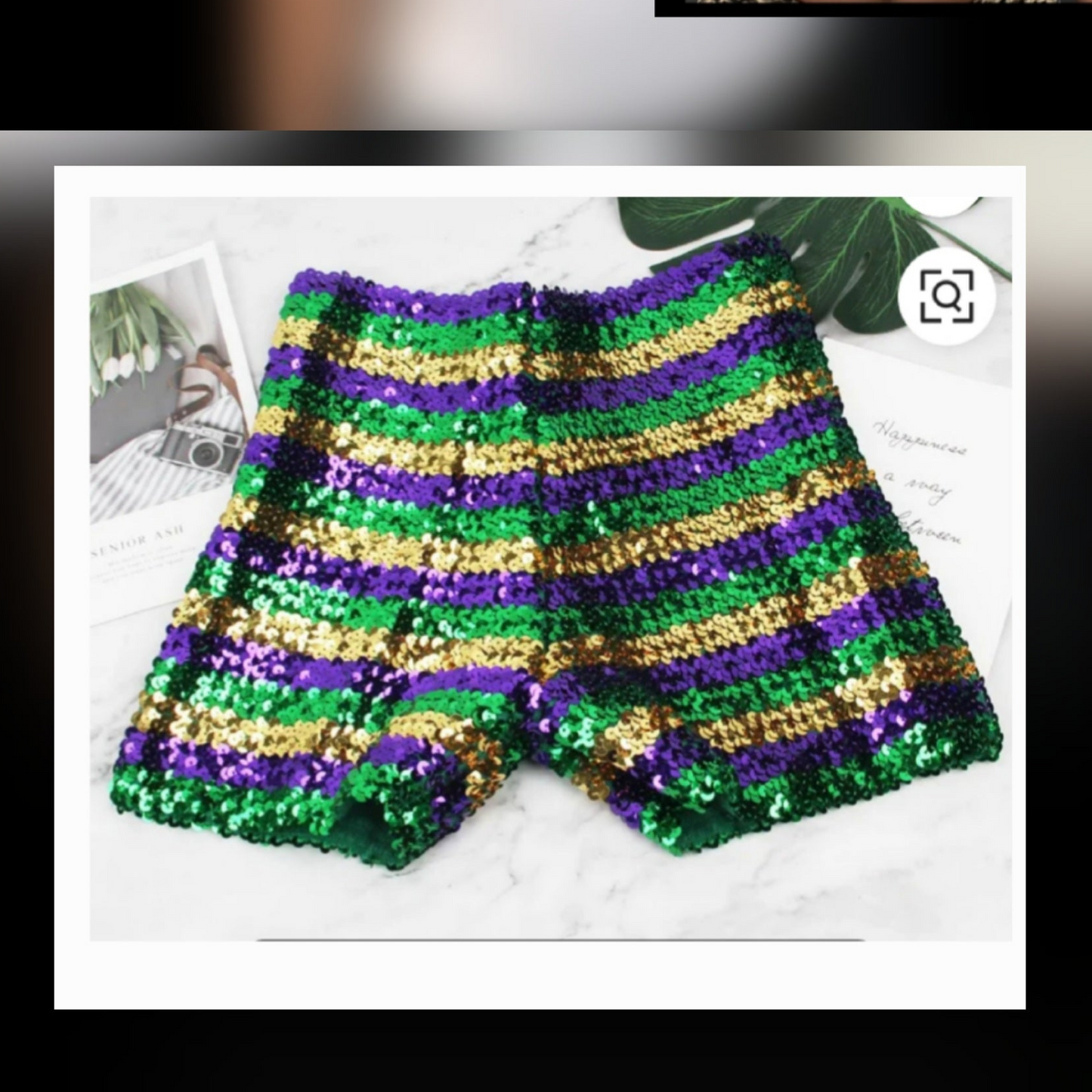 Mardi Gras festive shorts in vibrant green, purple, and gold sequin stripes, perfect for celebrating.