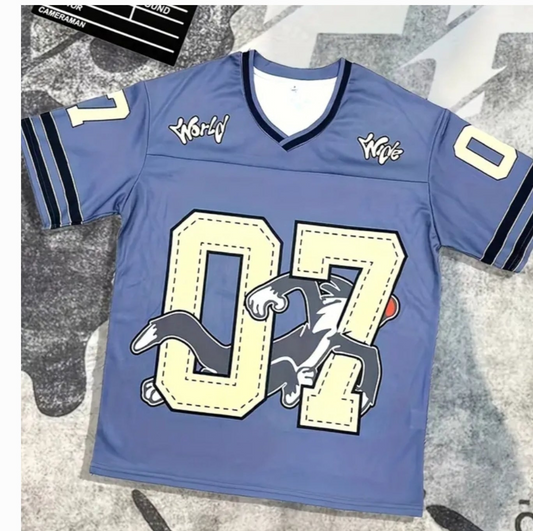Oversized unisex jersey featuring graphic design and number 07 on a light blue fabric, perfect for casual wear.