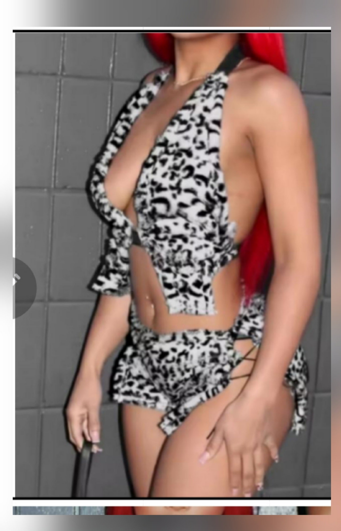 Cheetah print fur skirt set featuring a halter top and matching skirt in a stylish black and white design.