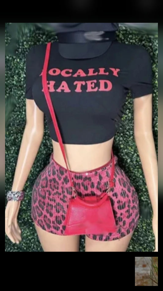 Cheetah Graphic Short Set featuring a cropped top and leopard print shorts with a red handbag.