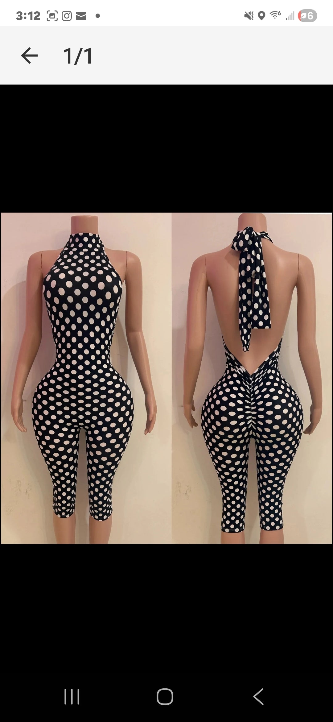 Polka Dot Capri Jumpsuit displayed on a mannequin, featuring a halter neck and an open back design.