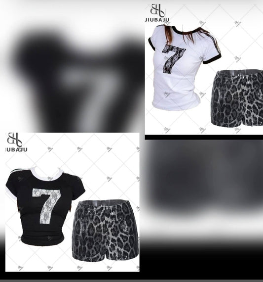 Graphic 7 short set featuring a black and white t-shirt and leopard print shorts.