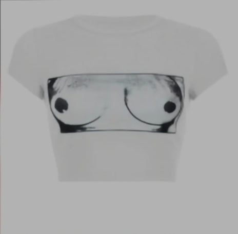 Graphic Crop Tee featuring a bold breast graphic design on a white background.