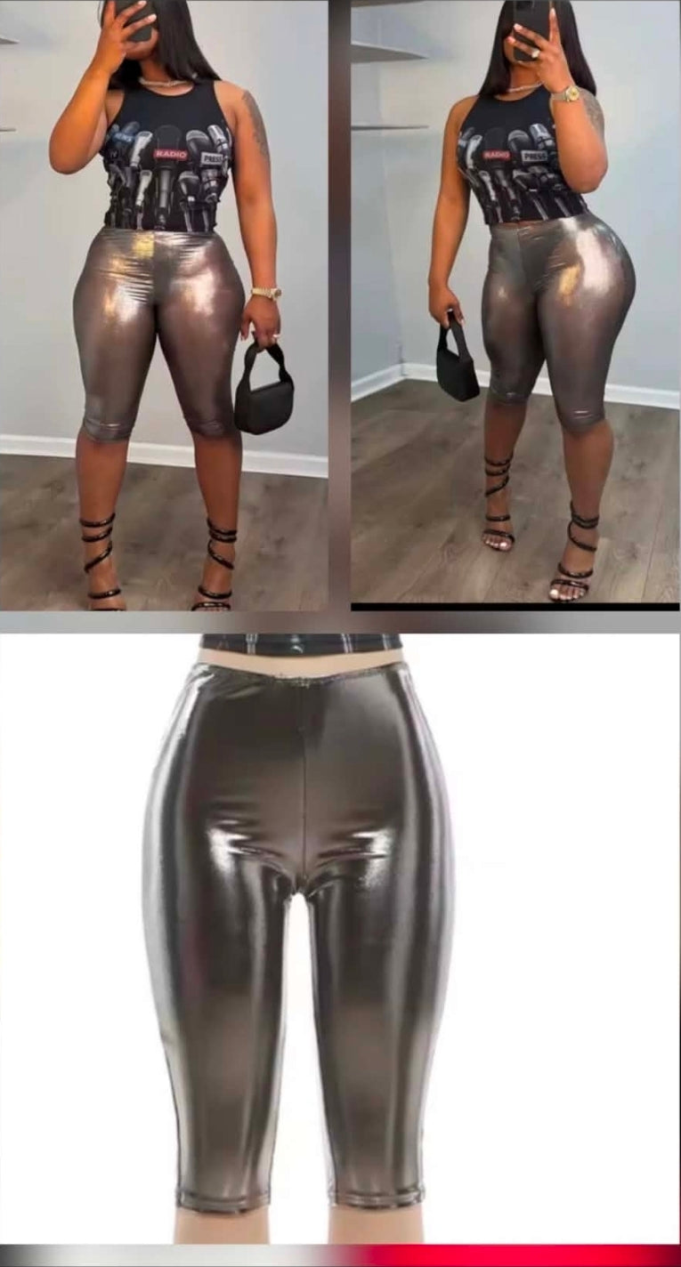Woman wearing transparent metallic capri pants paired with a stylish top and heels.